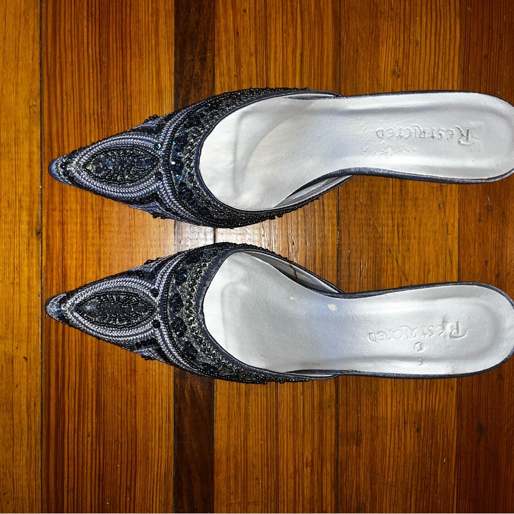 Restricted Black and Silver Mules with Ornate Detailing